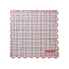 RICE Baumwoll-Serviette Karo in Himbeerrosa mit Wellenrand